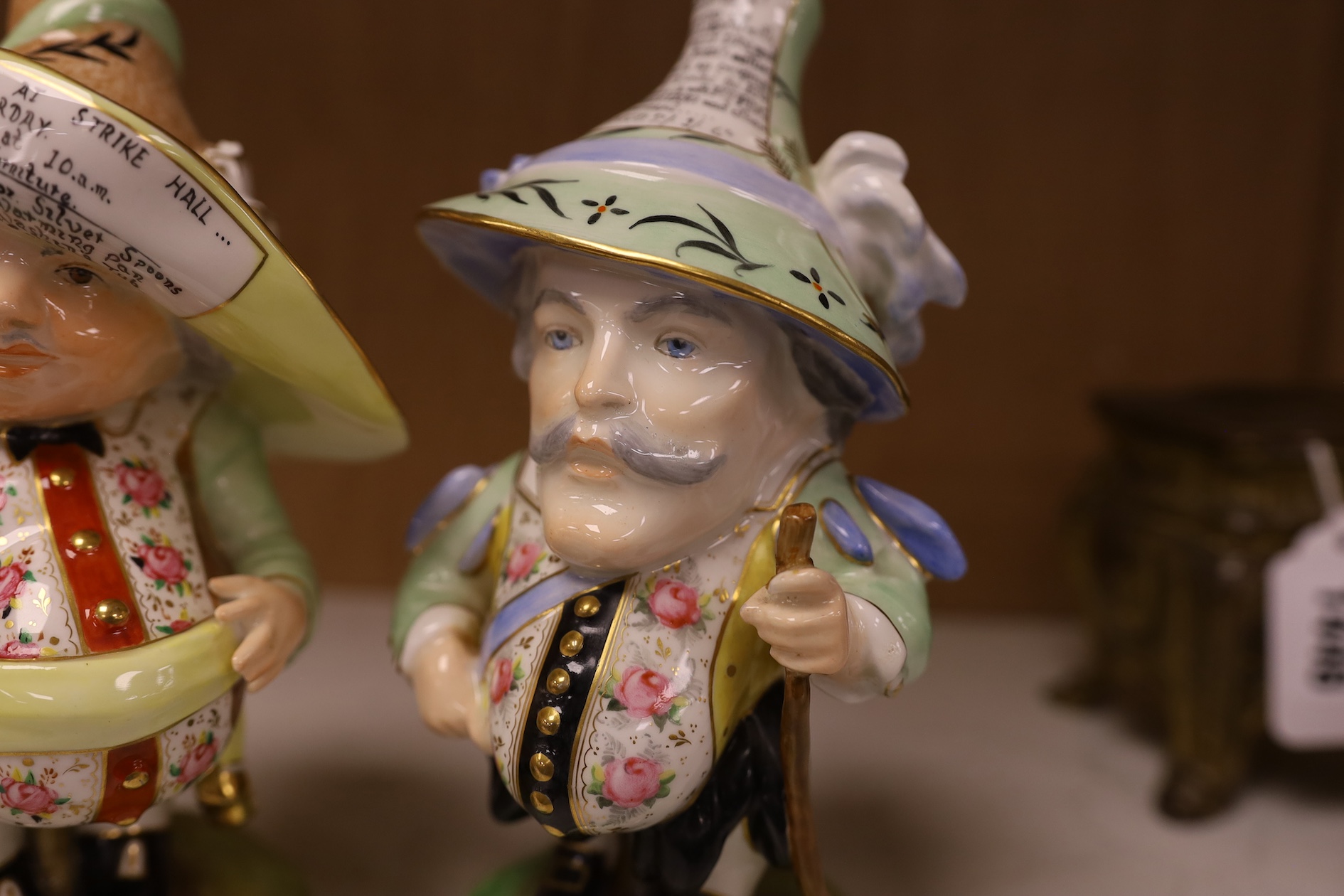 A pair of Derby Sampson Hancock Mansion House dwarves, late 19th century, tallest 18.5cm high. Condition - good